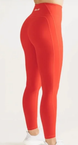 Alphalete pulse surge leggings in color Coral womens size S /RG3/120