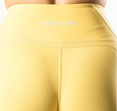 Alphalete Pulse Surge Leggings in color CITRUS Womens size S /RG7/120
