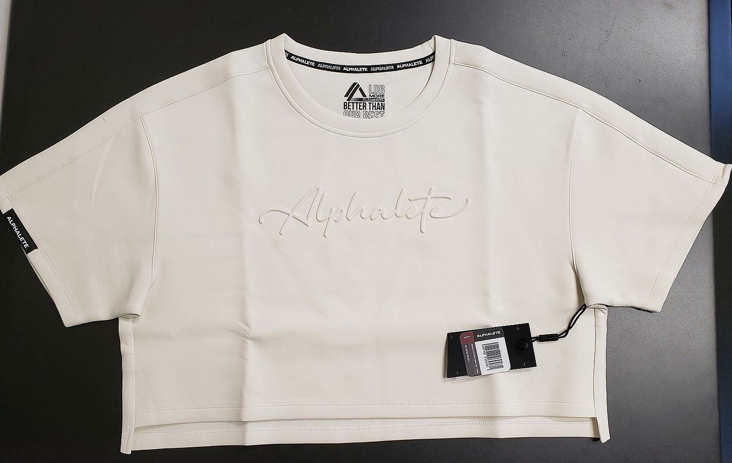 NEW Alphalete Woman’s ELMTS Short SLEEVE Crop Cream (269481) Size L DA10a/22