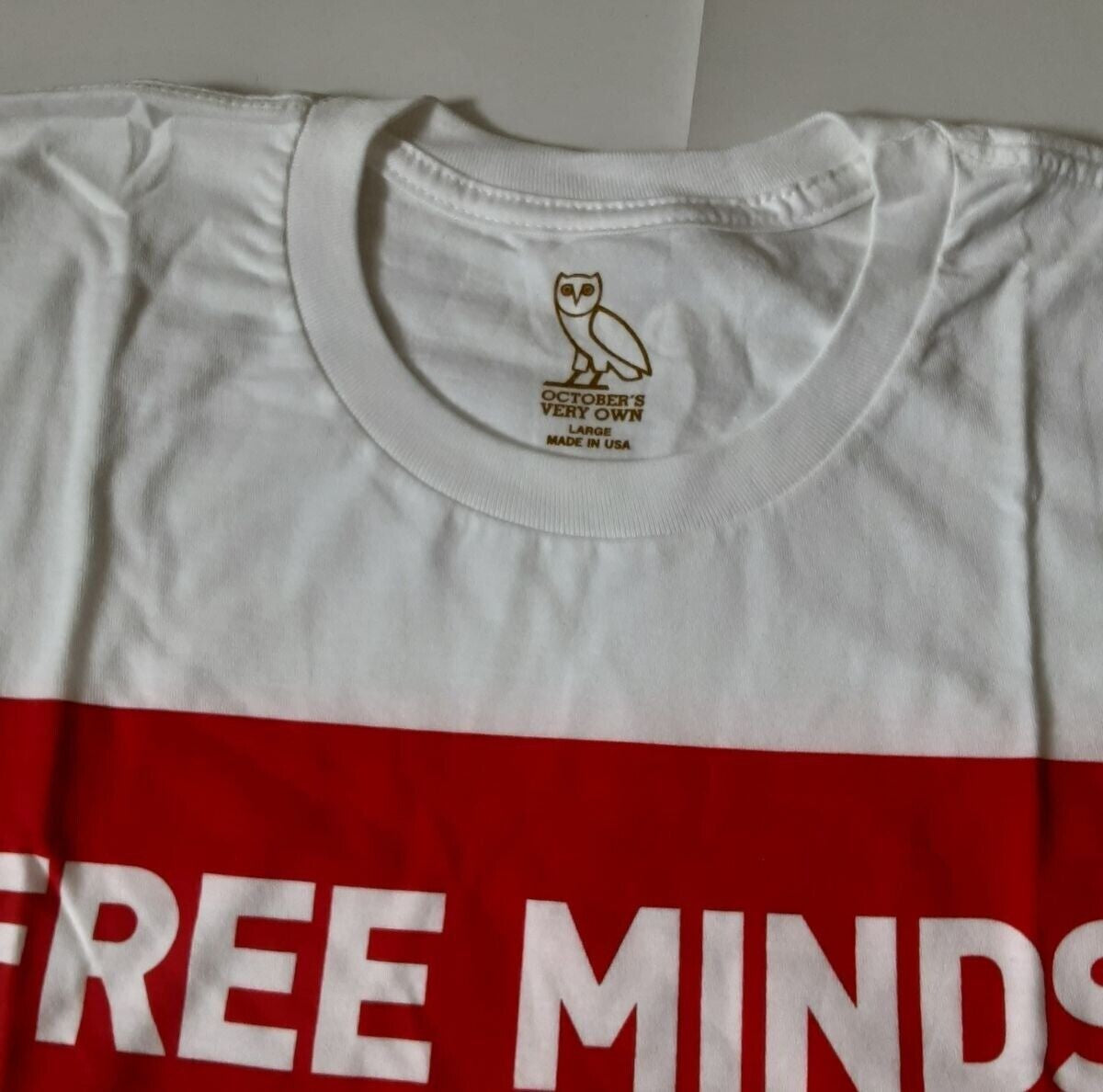 New October's Very Own OVO FREE MINDS WHITE T-Shirt Sh/Slv ( Size LG) RA63